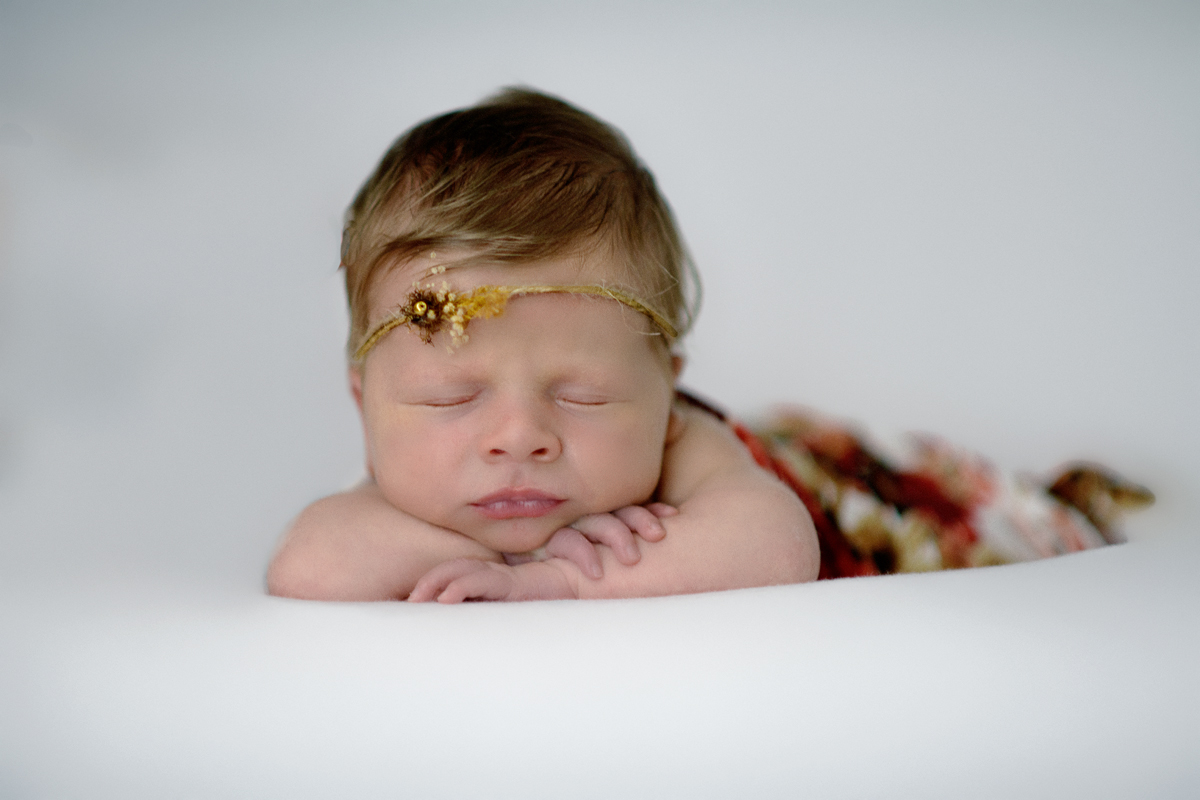 Newborn photo in studio by Lisa Rowland